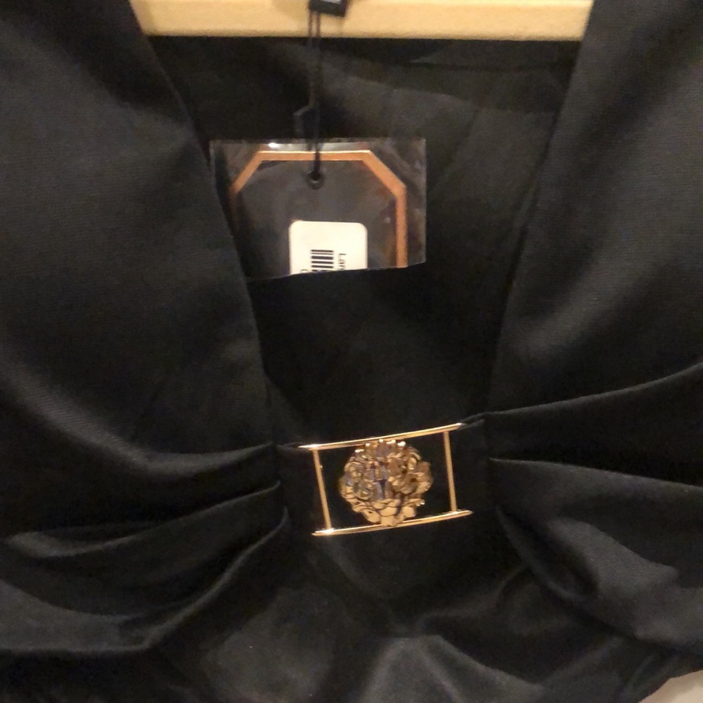 Sexy black crop top with lion hardware with built-in bra cups. - Picture 8 of 14